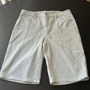 So slimming girlfriend, slim leg shorts, Chicos size one (medium) blue and white